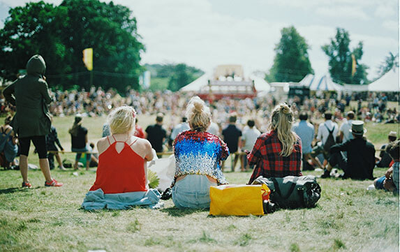 Young women at a music festival. Photo by Aranxa Esteve on Unsplash