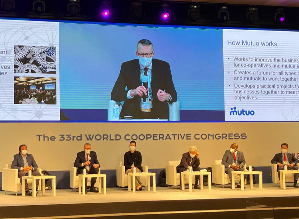 Peter Hunt, speaking at World Coop Congress in Seoul about how Mutuo's policy-led strategies for cooperatives & mutuals have built partnerships with govt to create new laws & improve the business environment, leading to the growth of coops and mutuals