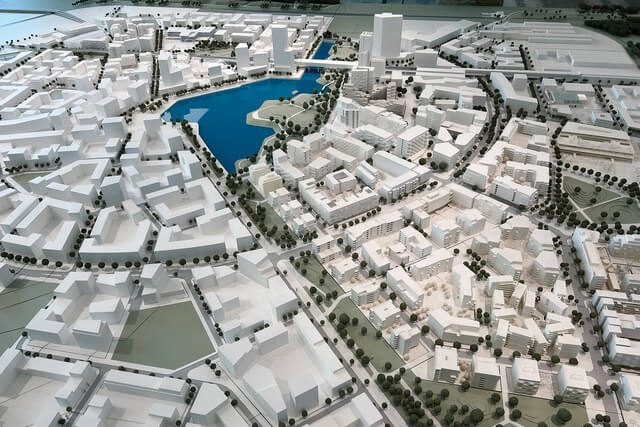 Master-plan model of the new ‘Quartier Am Seebogen’ (AWIG2). Twenty-five thousand people will live/work on a reused 100-hectare airfield on the U2 subway. (Vienna’s Hobsonville, but on a train line and with about eight times the density.) Innovative developer architect teams, procured by Municipal Vienna, were evaluated against the ‘four pillars’. Image: Christopher Kelly